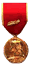 médaille de vermeil pour un service continu dans le même établissement décernée par la Société Industrielle de l'Est. La durée de présence n'est pas précisée dans la source
